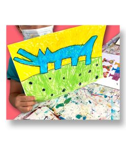 Young boy proudly holding barking dog oil pastel after private art lesson.